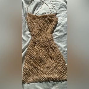 All gold pearl dress. True to size. I have only worn it once for my birthday.